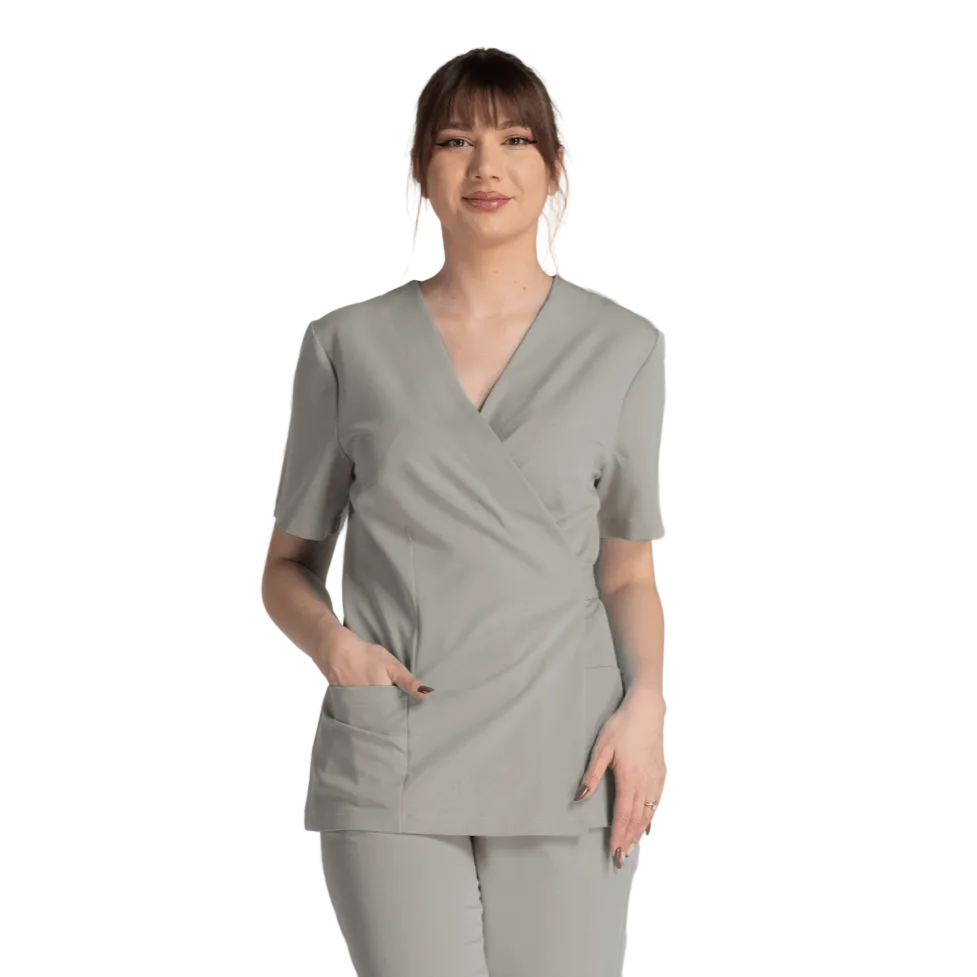 Bluza Elastica Bianca, bluză cu design ergonomic, două buzunare, ajustare talie, material elastic superior.