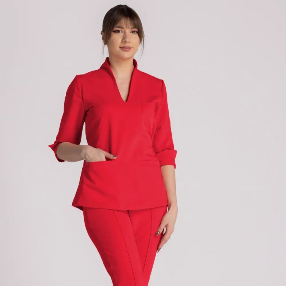 Bluza Elastica Elise red medical uniform with pockets and adjustable fit for professionals.