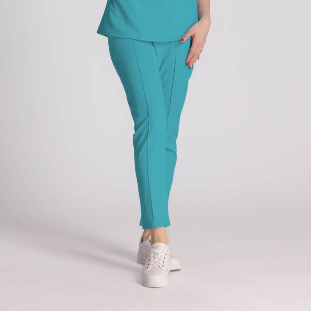 Pantaloni Elastici Elise în nuanță turcoaz, confecționați pentru confort și stil în mediul profesional.